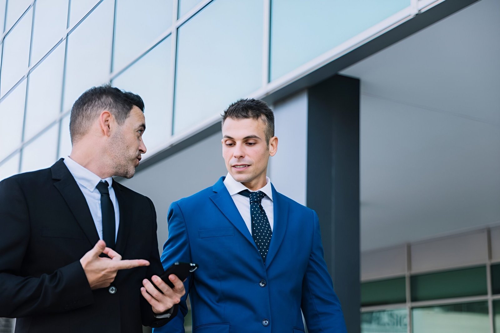 corporate-businessmen-talking_23-2147707164-Picsart-AiImageEnhancer